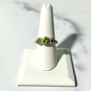 1.50ctw Round Peridot With 0.58ctw Round White Zircon Sterling Silver Ring
